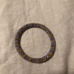 purple, yellow, and blue glass beaded bracelet